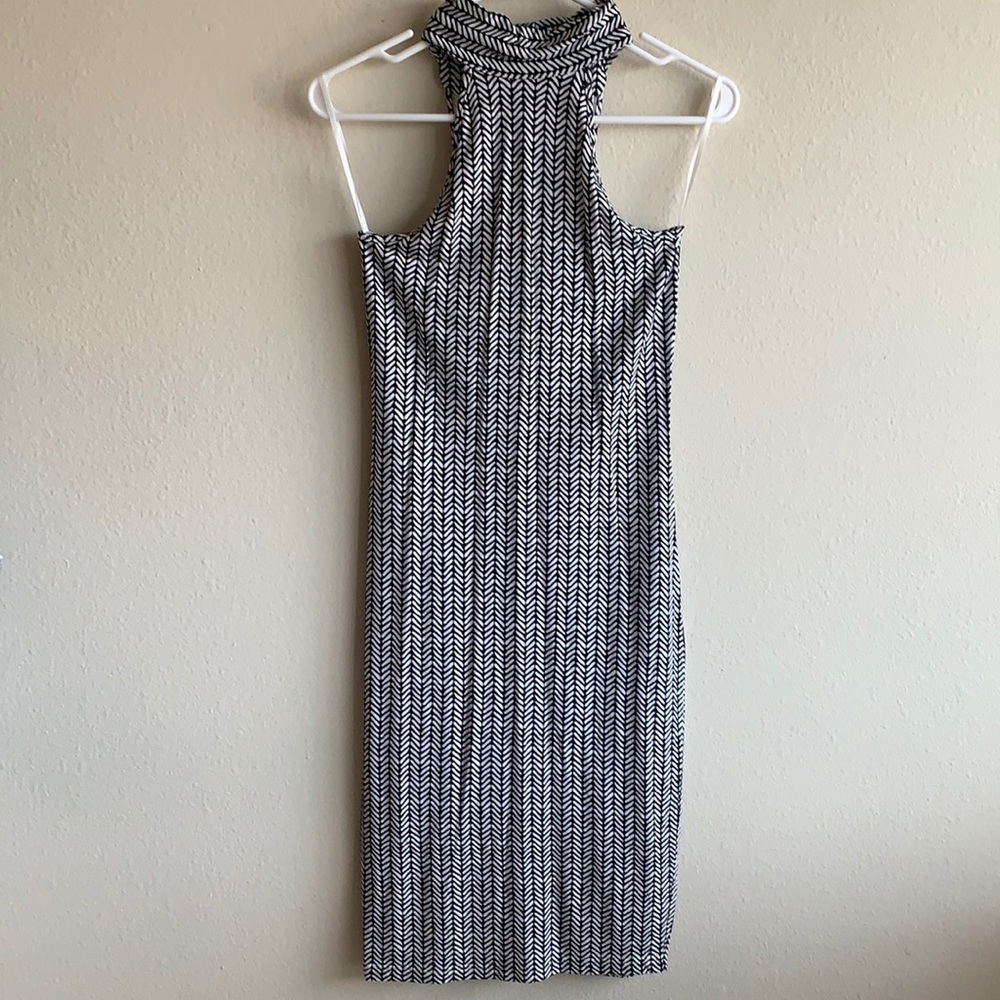 Black and white body con turtle neck dress